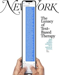 a person holding an electronic device in front of the cover of a new york magazine