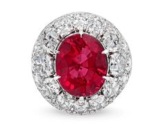 A radiant red 8.50-carat ruby dazzles at the center of this elegant ring. The stunning gem is certified by Gemresearch Swisslabs as being Mozambique in origin. Mozambique rubies are particularly prized, as they are considered to be the finest examples of the red gemstone found in African mines. The stunning red jewel is framed by a sparkling halo of white diamonds totaling approximately 8.42 carats. The stunning ruby combined with the brilliant white diamonds creates an exquisite effect on the f Golconda Diamond, Unique Pearl Necklace, Radiant Red, Red Jewel, Unique Diamond Engagement Rings, Antique Diamond Rings, Jewelry For Sale, Jewels Rings, Jewelry Showcases