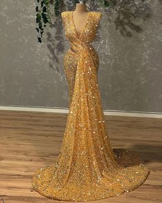 Gold V-neck Evening Dress With Sweep Train, Yellow V-neck Party Gown, Gold V-neck Evening Dress, Glamorous Gold V-neck Evening Dress, Gold V-neck Evening Dress For Prom, Gold V-neck Gown For Prom, Gold Sequined V-neck Dress, Gold V-neck Sequin Dress, Gold Sequined V-neck Gown