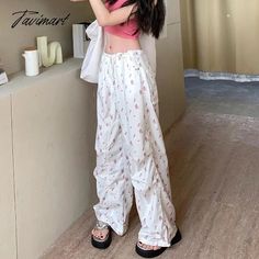 TAVIMART Streetwear Floral Printed Casual Cargo Pants Women Summer New High Waist Drawstring Pleated Loose Wide Leg Pants There may be errors in manual measurement, 1-3cm error is normal. The color in the image could look slightly different from the actual product. White Baggy Drawstring Pants, White Drawstring Trousers, White Bottoms With Drawstring And Long Pants, White Drawstring Long Pants, White High Waist Drawstring Pants, High Waist White Drawstring Pants, White High Waist Pants With Drawstring, White Harem Pants For Beach Spring Season, White Harem Pants For Beach In Spring