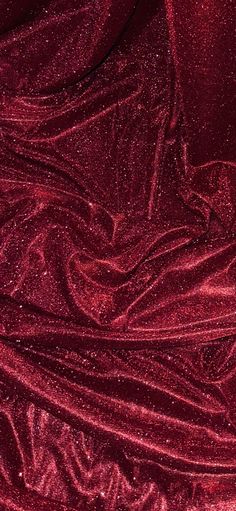 a red velvet background that is very shiny