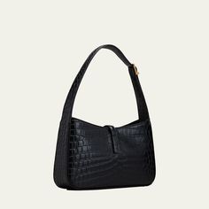 Saint Laurent "Le 5 A 7" hobo bag in shiny crocodile-embossed calf leather Adjustable shoulder strap, 10.2" drop Hook fastening Bronze hardware. Internal zip pocket Approx. 6.3"H x 9.8"W x 2.4"D Item weight, approx. 0.80 lbs. Made in Italy Luxury Crocodile Pattern Everyday Shoulder Bag, Luxury Everyday Shoulder Bag With Crocodile Pattern, Elegant Baguette Bag With Crocodile Pattern For Everyday Use, Chic Leather Baguette Bag With Crocodile Pattern, Leather Baguette Bag With Crocodile Pattern For Everyday Use, Elegant Everyday Baguette Bag With Crocodile Pattern, Ysl Shoulder Bag, Bronze Hardware, Leather Bag Women