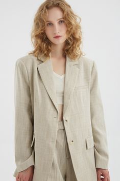 This oversized blazer made with linen pairs well with all outfits. Drawing inspiration from unisex apparel, you can match it with a slim spaghetti strap or t-shirt and baggy pants. Linen is cooling and highly breathable, perfect for sunny days and cool summer nights. Style #: WWSH910 Summer Business Casual Relaxed Fit Blazer, Classic Everyday Spring Blazer, Classic Everyday Blazer For Spring, Spring Single Breasted Everyday Blazer, Spring Oversized Blazer With Welt Pockets, Summer Relaxed Fit Blazer With Lapel Collar, Summer Oversized Single-breasted Blazer, Oversized Single Breasted Summer Blazer, Oversized Everyday Spring Blazer