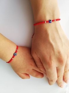 Adjustable Red Bracelet For Birthday, Red Bracelets For Mother's Day, Handmade Red Bracelets For Birthday, Adjustable Red Birthstone Bracelet, Red Evil Eye Bracelet Gift, Red Sterling Silver Jewelry For Friendship, Mom Dad And Baby, Eye Motif, Personalized Best Friend Gifts