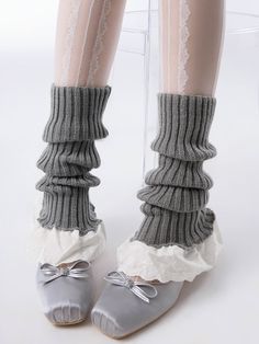 Elevate your outfit with these adorable knitted leg warmers. Perfect for adding a touch of sweetness to any look, these leg warmers feature delicate cotton lace trim and a cozy knit fabric. Embracing the popular Korean fashion style, these leg warmers are a versatile addition to your wardrobe. The flared design adds a playful and feminine touch, making them a perfect match for skirts, dresses, or even shorts.   Please note that this product includes one pair of leg warmers only. Gray Knit Bottoms For Winter, Gray Knit Bottoms For Fall, Cute Fitted Knee-high Socks For Fall, Cotton Leg Warmers For Spring, Cozy Cotton Leg Warmers One Size, Winter Cotton Knee-high Socks, Cozy Cotton Leg Warmers For Spring, Cute Fitted Winter Socks, Fitted Knitted Gray Socks