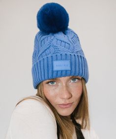 A winter classic. The Ida is a chic cable knit beanie with a classic silicon Gigi Pip label + fluffy faux fur pom in 3 staple colors. This lightweight fold over style is exactly what you need to keep you warm throughout the chilly winter szn, whether your home town is a snowy tundra or even just gets below 50's! Create the ultimate monochromatic winter look by pairing with other popular styles from the Winter Resort Collection HERE! Snowy Tundra, Gigi Pip, Winter Resort, Cable Knit Beanie, Beanie Style, Halo Style, Home Town, Wearing A Hat, Popular Styles