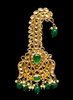 Kalgi jewelry for Pagri made out of CZ crystals and pearls & Emeralds Spiritual Kundan Jewelry With Intricate Design, Bollywood Style Emerald Kundan Necklace For Wedding, Spiritual Kundan Jewelry Hand Set, Emerald Jewelry With Stone Work For Festivals, Emerald Jewelry With Stone Work As Gift, Emerald Jewelry With Stone Work For Gift, Ceremonial Spiritual Hand-set Jewelry, Spiritual Hand Set Ceremonial Jewelry, Spiritual Hand-set Ceremonial Jewelry