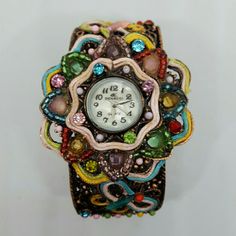 Spring Hinged Cuff Bracelet Watch Has Multi-Colored Crystals And Silk Threads Picking Out Coils And Butterflies. Band 30mm Wide. Watch Face 1 3/4" Vintage Multicolor Analog Watches, Multicolor Analog Watches As Gift, Multicolor Analog Watches For Gift, Vintage Multicolor Quartz Watch, Gift Multicolor Analog Watches, Multicolor Bracelet Strap Watch As Gift, Multicolor Watches With Bracelet Strap As Gift, Spring Hinge, Watch Faces