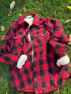 Featuring an oversized fit, left chest embroidery, and soft sherpa lining, the Wisconsin Plaid Sherpa Shacket offers a perfect blend of style and comfort. Crafted from buffalo plaid fabric, it is ideal for cooler temperatures. Sherpa Shacket, Buffalo Plaid Fabric, Plaid Fabric, Buffalo Plaid, Wisconsin, Buffalo, Plaid, Embroidery, Fabric