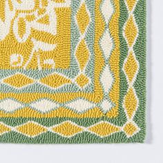 an image of a yellow and green rug