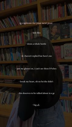 the back of a person's head in front of a bookshelf filled with books