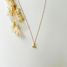 Our dainty 14K gold filled flower necklace is the perfect year round accessory and can be worn alone or layered with other chains. Flower charm is three dimensional, lightweight, and a delicate addition to any outfit. 16 inch chain length with extender chain. THE DETAILS -Shipped via USPS with tracking -14K gold filled chain and clasps Minimalist 14k Gold Filled Jewelry With Flower Charm, Dainty Charm Necklace With Delicate Chain, Dainty Charm Necklaces With Delicate Chain, Dainty 14k Gold Filled Charm Necklaces For Everyday, Dainty Everyday Charm Necklaces In 14k Gold Filled, Everyday Tiny Charm Necklaces In 14k Gold Filled, Everyday Tiny Charm Necklace In 14k Gold Filled, Rose Gold 14k Gold-filled Charm Necklace With Delicate Chain, Everyday Flower Pendant Clavicle Chain Necklace