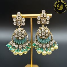 Premium Moissanite Earring with high qualtiy beads and hanging Pearl Nickel Free Metal : Brass Perfect for all big occasion Designer wear Handcrafted Note: Don't Put Perfume on the Earring Elegant Chandbali Earrings With Dangling Beads, Fusion Style Dangling Beads Party Earrings, Kundan Earrings With Dangling Beads For Celebration, Elegant Green Chandbalis Drop Earrings, Elegant Green Dangle Chandbalis, Elegant Green Chandbalis, Kundan Earrings With Dangling Beads For Party, Fusion Pearl Drop Earrings For Party, Festive Green Dangling Beads Earrings