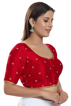 Classic is never old and enough to have in your closet!! Pair this fashionable blouse with a beautiful printed sari and statement neck piece and your are good to go. Product Features: Color: Red Fabric: Silk Work: Embroidered Sleeve length: Short sleeves Collar Type: Round Neck Type: Padded Blouse Style Fit: Regular fit Closure Type Work: Front Open Wash Care: First wash dry clean only Occassion: Festive Product Type: Blouse Disclaimer: There will be slight difference in digital to actual image Red Semi-stitched Blouse For Navratri, Designer Semi-stitched Red Blouse, Red Padded Blouse For Navratri, Red Semi-stitched Unstitched Blouse Piece, Semi-stitched Red Unstitched Blouse Piece, Semi-stitched Red Blouse For Diwali, Red Semi-stitched Blouse For Diwali, Transitional Saree With Padded Blouse, Red Semi-stitched Blouse For Festivals