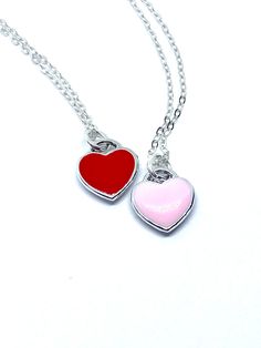 Description This tiny heart necklace is minimalistic and beautiful! Choose a pink or red heart as a symbol of your love that she can wear all the time. The heart hangs on a delicate sterling silver chain. Just choose the length. This necklace would make a lasting and memorable gift for Valentine’s Day, an anniversary, a birthday or anytime you want to let someone know they are loved! Connect Let’s stay in touch: Sign up for my VIP list for coupons, to be the first to see new releases and to be e Friendship Necklace With Heart Pendant And Charm, Double Heart Charm Necklace For Friendship, Valentine's Day Necklace With Heart Charm For Friendship, Friendship Necklace With Heart Pendant, Dainty Heart Necklace For Friendship, Heart Charm Necklace For Friendship, Elegant Heart-shaped Necklace For Friendship, Heart Pendant Charm Necklaces For Valentine's Day, Pink Sterling Silver Heart Necklace