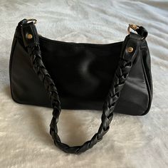 Cute Jacqueline Vintage Vegan Leather Shoulder Bag In The Color Black With Gold Hardware, A Braided Handle That Hangs Just Right At 8.75 Inches And An Interior Zipper Pocket. Brand New, Unworn, But Missing Original Tag. Dimensions: 11" X 2.5" X 5.5" Drop-Length: 8.75" Bags Vintage, Vintage Bags, Gold Hardware, Vintage Black, Leather Shoulder Bag, Zipper Pocket, Vegan Leather, Black Color, Vintage Ladies