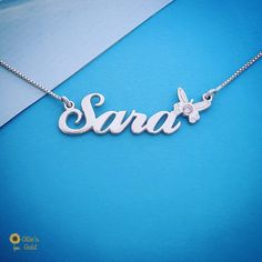 🌻 Butterfly Name Necklace in Sterling Silver with Birthstone - Sara Style 🌻 Sterling Siver 925 🌻 Made to Order/Order any Name 🌻10.5 mm Tall Capital 🌻 You can choose your chain length and chain type at checkout 🌻1.2 mm Upgraded Nameplate Thickness 🌻 Production Time is 7-14 working days 🌻 Please upgrade your shipping if you would like to expedite delivery Script Necklace, Sterling Silver Name Necklace, Mama Necklace, Classic Names, Name Jewelry, Butterfly Charm, Name Plate, Name Necklace, Necklace Designs