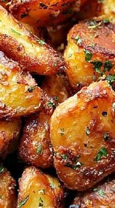 cooked potatoes with herbs and seasoning on top