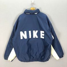 Vintage Nike Hoodie Puffer Windbreaker Nike Swoosh Jacket | BS63304.  Manual Measurement (Laying Flat): 1) Chest: 29 Inch. 2) Length: 30 Inch. 3) Shoulder: 26.5 Inch. 4) Sleeve: 23 Inch. Please check measurements to insure a proper fit. Remember to allow yourself some extra room for movement. You can compare these with something from your closet that fits you well. Fabric Material: 100% Nylon. In good Condition overall. BS63304.  We do combine shipping. Note: Item sold without original box and r Nike Swoosh Jacket, Windbreaker Nike, Vintage Nike Hoodie, Nike Sweats, 90s Nike, Nike Vintage, College University, Nike Swoosh, Nike Hoodie