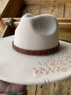 * Handmade by a small business in Texas * Measures 0.5" x 20" * Adjustable to fit the crown of your hat * Made with quality materials * Perfect for rodeos, shows, or just adding a touch of western to your hat! * Check out other hat band designs in my Etsy shop! Adjustable Beige Felt Hat With Flat Crown, Adjustable Cream Felt Hat With Flat Crown, Cream Fedora With Adjustable Flat Crown, Adjustable Cream Fedora With Flat Crown, Adjustable Flat Crown Cream Fedora, Adjustable Felt Hat With Curved Brim For Western-themed Events, Adjustable Top Hat With Flat Crown For Ranch, Adjustable Felt Hat For Western-themed Events, Adjustable Beige Felt Hat For Ranch