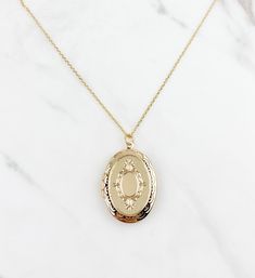 "Large Locket necklace, oval Locket necklace, gifts for her, birthday gift, vintage look locket, gold plated locket necklace, jewelry, gifts *Large Oval shaped locket suspended on dainty gold plated cable chain *Oval locket pendant is approx 1.25\", inside size is approx 7/8\" *Chose your perfect length SHIPPING: *Free domestic shipping on all orders PACKAGING: *All pieces come beautifully packaged, perfect for gift giving. Find more to ❤️ here: http://etsy.com/shop/thejewelrystandard" Elegant 14k Gold Oval Locket Necklace, Formal Gold Oval Locket Necklace, Dainty Gold Oval Locket Necklace, Elegant Gold Oval Locket Necklace, Timeless Oval Locket Necklace, Orders Packaging, Oval Locket Necklace, Wattpad Ideas, Locket Necklaces