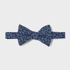 Update your formal accessories collection with this Bow Tie from Goodfellow & Co™. This stylish bow tie made from lightweight material with partial lining offers comfortable wear. It features a pre-tied style with an easy-close fastener for simple on and off. Pair it with your favorite dress shirt and suit jacket to complete your formal look. Goodfellow & Co™: Where style & fit are always in good company Summer Blue Bow Tie Suit Accessories, Summer Blue Bow Tie And Suit Accessories, Summer Blue Bow Tie And Accessories, Dapper Formal Ties For Spring, Dapper Spring Formal Ties, Formal Spring Dapper Ties, Blue Summer Bow Tie For Business, Blue Bow Tie For Summer Business Events, Classic Blue Suit And Tie Accessories For Summer