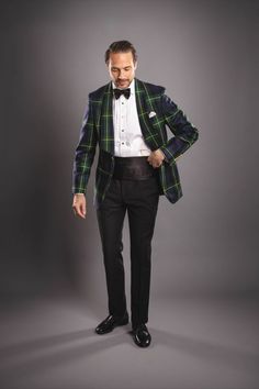 Whether you are headed to a Christmas party or a New Year's Eve soiree, we humbly suggest this statement piece for your holiday party outfit rotation. Our Gordon modern tartan plaid dinner jacket was designed with the festive season in mind. Pair it with some classic black tuxedo pants for an elegant touch at your next holiday party. Tap to shop this show-stopping dinner jacket for men! Custom Fit Single Breasted Long Sleeve Suits, Fitted Outerwear With Hidden Button And Shawl Collar, Semi-formal Shawl Collar Single Breasted Outerwear, Fitted Business Outerwear With Shawl Collar, Single Breasted Tuxedo Style Outerwear For Fall, Single-breasted Tuxedo Style Outerwear For Fall, Fall Tuxedo Style Single-breasted Outerwear, Custom Fit Single Breasted Blazer For Fall, Single Breasted Blazer For Fall