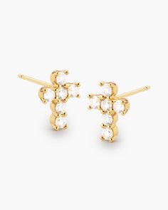 Stylish and striking, our gold Cross Stud Earrings will elevate your look instantly. Carefully constructed with 12 perfectly handset diamond simulants in a luxurious gold setting. Cross Stud Earrings, Mens Earrings Studs, Cross Earrings Studs, Solid Gold Chains, Diamond Simulant, Silver Shop, Mens Gold, Gold Cross, Elevate Your Look