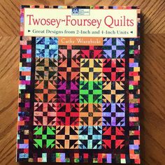 a book on quilting that is sitting on a table