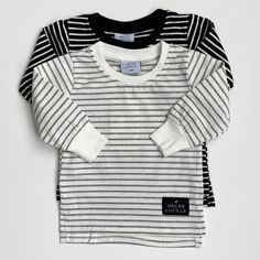 Lightweight cotton striped tee in black and white or white and grey. The back is designed to hang slightly longer than the front. Pair with our cotton joggers and minimalist beanie! 95% cotton 5% spandex Machine wash cold. Long Sleeve Striped Shirt, Fall Family Photo Outfits, Family Photo Outfits, Fall Clothes, Striped Long Sleeve Shirt, Fall Family, Diy Baby, Nicole Miller, Striped Tee