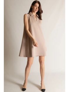 This dress is so buttery soft you will want it in every color! Timeless collard neckline, and modest length make this dress a staple in your wardrobe. Chic A-line Dress For Business Casual, Chic Solid Color A-line Shirt Dress, Casual V-neck Midi Dress For Semi-formal Occasion, Beige Knee-length Semi-formal Dress, Chic Shift Midi Length Shirt Dress, Elegant Spring Shift Shirt Dress, Elegant Shift Shirt Dress For Spring, Chic Shift Midi Dress For Daywear, Chic Sleeveless Shift A-line Dress