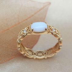 Dainty Lace Breastmilk Oval Ring in Solid Gold, White Gold, Rose Gold - DIY KIT ❤Please Note This is a DIY kit for you to make your own jewelry. If you want us to make your jewelry, please feel free to contact us for details. ❤Specification: - Material: 10k, 14k solid gold - Color: rose gold, white gold, yellow gold - Breastmilk Stone size: 6x8mm - Stone: cubic zirconia - Stone size: 1.5mm, can be changed to any birthstones you like. - Ring size: 4-9 (All sizes available, please feel free to contact me if you need another ring sizes) ❤The DIY kit includes everything you need for making the ring: - Breastmilk preservation - Liquid A, Liquid B - Plastic cup, syringe, mixing stick, plastic bag, silicone mold, plastic pipette - One 10k solid ring with a 10k stamp on them - Matching silicone mo Luxury Oval Moonstone Anniversary Ring, Gift White Opal Gemstone Ring, Heirloom White Opal Ring Oval Cabochon, Elegant White Opal Birthstone Ring, Oval Cabochon Moonstone Ring, Formal White Birthstone Ring With Gemstone, Oval Moonstone Ring In Fine Jewelry Style, White Gemstone Birthstone Ring For Formal Occasion, Luxury Oval Moonstone Wedding Ring