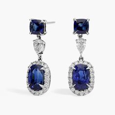 These classic sapphire and diamond drop earrings feature two stunning oval sapphires surrounded by a sparkling diamond halo which cascade down from a sapphire and diamond drop. Sapphire And Diamond Earrings, Blue Sapphire Diamond, Sparkling Diamond, Diamond Drop Earrings, White Gold Earrings, Diamond Drops, Pear Diamond, Diamond Halo, Precious Gemstones