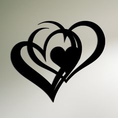 two heart shaped cut outs on the wall