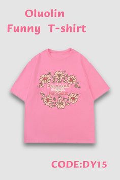 a pink t - shirt with flowers on it and the words,'oohin funny