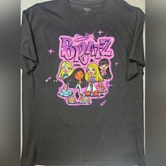 Bratz Womens T-Shirt Xl Black Purple Graphic Tee 90s Y2k Retro Cartoon Style New Brand New Without Tags Never Worn Bratz Womens T-Shirt Xl Black And Purple Graphic Tee 90s Y2k Style Nwot 100% Cotton Channel Your Inner '90s And Y2k Vibes With This Trendy Bratz Women's T-Shirt. Featuring A Bold Purple Graphic Of The Iconic Bratz Characters, This Black Tee Is Perfect For Fans Of Retro Cartoon Style. Soft And Comfortable Cotton Blend Crew Neck, Short Sleeves, Relaxed Fit High-Quality Print Featuring Purple Cotton Y2k T-shirt, Purple Grunge T-shirt With Letter Print, Trendy Purple T-shirt With Logo Print, Trendy Purple Tops With Logo Print, Pink Y2k T-shirt For Streetwear, 90s Inspired Sublimation Print T-shirt For Streetwear, Y2k Pink Tops With Graffiti Print, Pink Y2k Tops With Graffiti Print, Pink Graffiti Print Y2k Tops