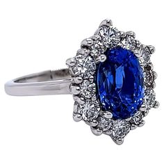 an oval shaped blue sapphire and diamond ring