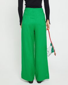 Product Details The Freda Pant's bright green hue is fun and fresh, while its high-waisted design and straight leg create a modern silhouette. Add this piece to your look for an instantly stylish upgrade. - Front button and zipper- Front pocket- Back pocket- Content: 30% Linen, 70% Rayon Style# C23WPA00225 Fit Notes - Model wearing a size XS - Model measurements: 5'8' Height / 32'' Bust / 23.5'' Waist / 34'' Hips- Garment measurements: Size Length Waist Hips XS 104.78 68.58 93.98 S 105.73 72.39 Straight Pants, Bright Green, Model Measurements, Front Zipper, Front Pocket, That Look, Straight Leg, High Waisted, Pants