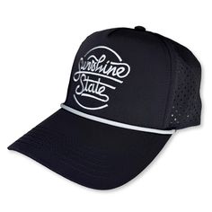 Our Sunshine State Script performance rope hat is lightweight, super breathable and the laser-perforated airflow makes it an ideal hat for warmer temperatures. The fit is just right for all. Our limited first run is available in black with grey embroidery. Performance poly fabric, five-panel design Laser-perforated side and back panels enhance airflow Woven grey rope along base of front panel Adjustable plastic snap closure - Part of the proceeds from the sale of this hat go to organizations tha Casual Black Breathable Sun Hat, Black Breathable Adjustable Sun Hat, Adjustable Black Breathable Sun Hat, Sports Mesh Baseball Cap With Flat Brim, Adjustable Baseball Cap With Ventilation, Mesh Flat Brim Baseball Cap For Sports, Lightweight Flat Brim Sports Hats, Sports Hats With Mesh Ventilation, Sports Hats With Ventilation And Mesh Material