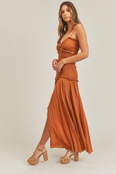 Our Cognac Proposal Smocked Maxi Dress features removable adjustable spaghetti straps so you can wear it strapless for that extra sultry look while your sitting at the pool. It has a smocked bodice, a front side slit, a bow at the bust and a small cutout detail directly under. 100% Rayon Size S: Length measures 56.5” from shoulder to hem with a 32” bust and 28” waist Size M: Length measures 57” from shoulder to hem with a 34” bust and 30” waist Size L: Length measures 57.5” from shoulder to hem Smocked Maxi Dress, Girls Smock, Waist Size, Backless Dress Formal, Red Formal Dress, Fashion Boutique, Strapless Dress Formal, Cognac, Smocking