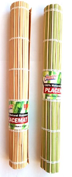 two bundles of bamboo sticks sitting next to each other