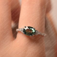 This ring features a 6*8 mm oval cut lab green sapphire. Customization is available. It is made by hand, and it will take about 7 days to finish the ring after your payment is completed. Main stone: 6*8 mm oval cut green sapphire Main stone weight: 1.75 ct Metal type: sterling silver /14k gold Accent stone: cz Customization is available, just fee free to contact me, it is free to engrave inside the ring, it is free, you can leave a ntoe with your order, but it will be great no more than 15 lette Wedding Ring White Gold, Sapphire Wedding Ring, Green Sapphire Ring, Green Gemstone Ring, Sapphire Wedding Rings, Teal Sapphire, White Sapphire Ring, Sapphire Wedding, Ring White Gold