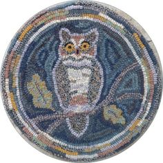 an owl rug is on the ground