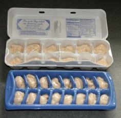 an ice tray filled with tooth paste next to a plastic container full of dental floss