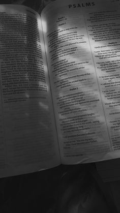 an open book sitting on top of a table