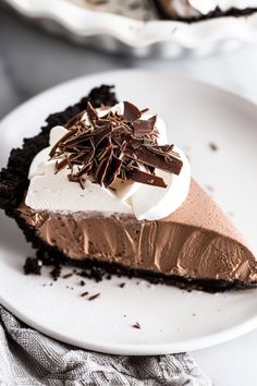 a slice of chocolate pie on a white plate