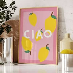 a pink poster with lemons and the word ciao on it