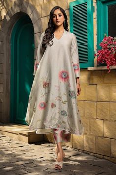 Ivory paneled kalidar kurta with all-over petite floral prints, highlighted with embroidery all over and lace hemline. Comes with coordinating pant. - Aza Fashions Traditional Ankle-length Salwar Kameez With Printed Motifs, Semi-stitched Ankle-length Kurta With Printed Motifs, Ankle-length Semi-stitched Kurta With Printed Motifs, Wedding Lawn Suit With Printed Motifs In Raw Silk, Wedding Printed Raw Silk Lawn Suit, Traditional Ankle-length Palazzo Set With Printed Motifs, Festive Ankle-length Kurta With Printed Motifs, Festive Ankle-length Printed Kurta, Wedding Kurta With Printed Motifs In Raw Silk