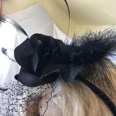 Fascinator Hat, Black Velvet, Silk Roses, Stripped Goose Feathers, a Marabou Wispy Feather. Head Band and Hair Clip. Black Bird Cage Veil. This fascinator is fun to add to your hairdo for any special occasion or just to dress up your look. Wear in your hair or on a hat for a glamorous touch. Floral Arrangement Adjusts on Headband. Remove from headband and clip into hair. For other vintage and homemade items see: www.VeryVictorianStudio.etsy.com For sewing related items see my other shop: www.Sew Black Hair Accessories For Spring Evening Events, Black Hair Accessories For Evening In Spring, Vintage Black Headpieces For Costume Party, Black Headband Costume Hats For Spring, Fitted Black Hair Accessories For Kentucky Derby, Black Fascinator For Halloween Party, Black Feathered Headband Fascinator, Fitted Black Feathered Headpiece, Black Feathered Wedding Costume Hat