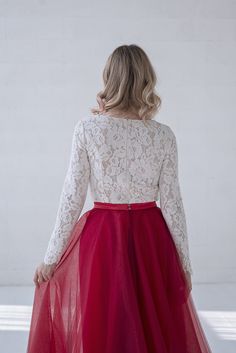 "Default features of this skirt: * It consists 3 tulle layers, fully lined in bridal satin. * Not gathered at the waist, completely flat. * Slim A line silhouette. * Non hand dyeable, but a vast color selection available. * Lining in half circle, wide and flowing. * Features a default train of 16\" or 40cm, can be slightly longer, shorter or none at all. * Tailored satin waistband, 1\" or 2.5cm waistband by default, matches the inner layers of the skirt by default, but can also be done otherwise Elegant Tulle Fabric For Bridesmaid And Prom, Elegant Red Dress With Tulle Skirt, Elegant Tulle Dress With Lined Skirt, Elegant Dress With Lined Tulle Skirt, Fitted Pleated Bridesmaid Dress, Fitted Tulle Dress With Lined Skirt, Pleated Full Skirt Wedding Dress, Elegant Bridesmaid Dress With Flared Skirt, Wedding Dress With Long Tulle Skirt